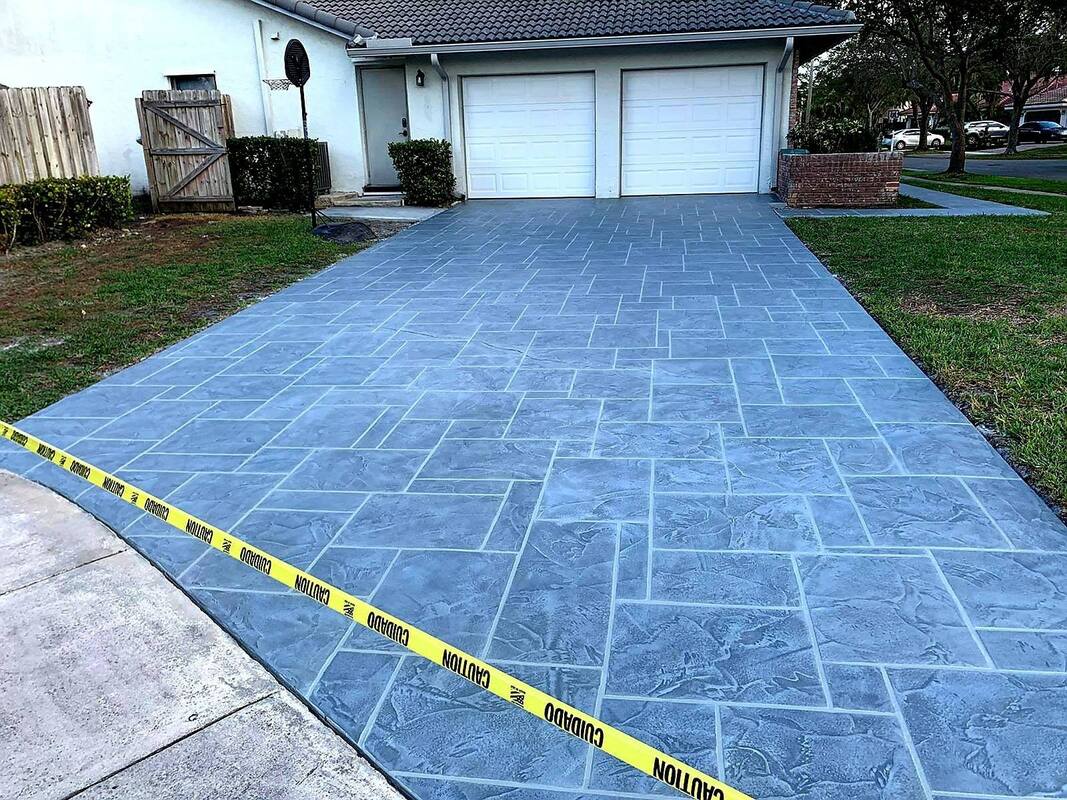 Recently completed driveway stamped concrete resurfacing in boca raton